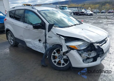 2016 Ford Escape Titanium z USA, uszkodzony, nr VIN 1FMCU9JXXGUA51005